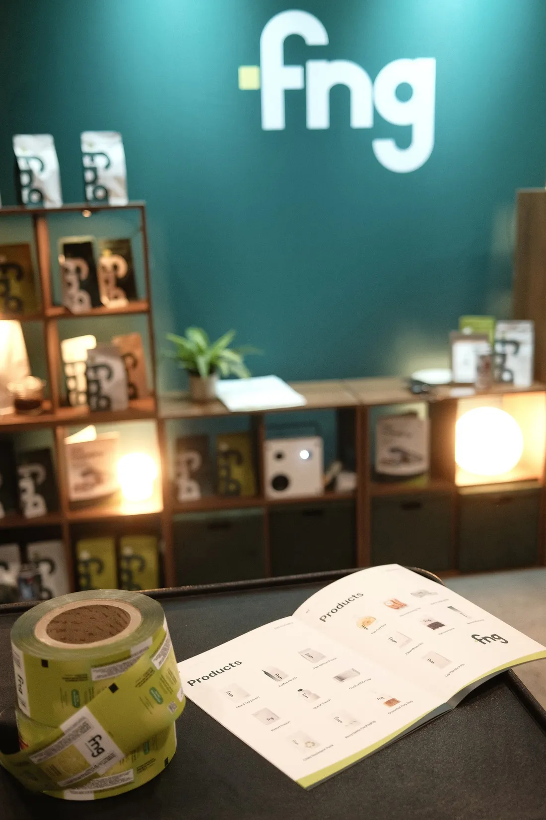 The FNG booth at CHFA, shelves of samples under the fng wall