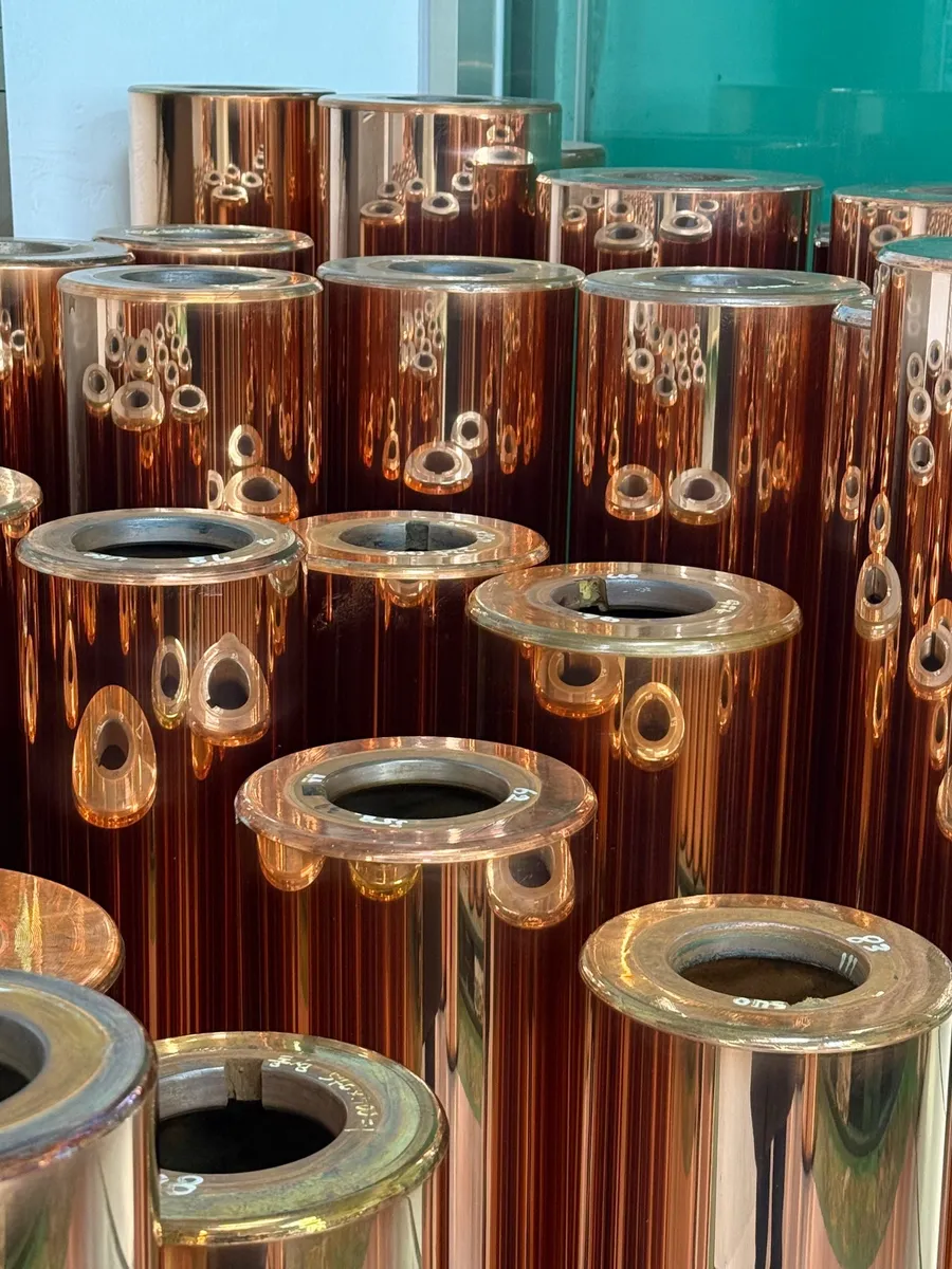 Engraved gravure printing cylinders racked in the plant